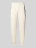 EA7 Emporio Armani Regular Fit Sweatpants mit Logo-Applikation Modell 'Train' Offwhite