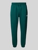 The North Face Regular tapered fit sweatpants met labelprint Groen