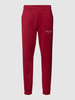 Tommy Hilfiger Sweatpants met labelstitching Kersenrood