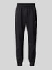 The North Face Regular tapered fit sweatpants met labelprint Zwart