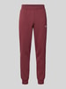 PUMA PERFORMANCE Sweatpants met labelstitching en elastische band Bordeaux