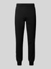 Lacoste Loose Fit Sweatpants aus reiner Baumwolle Modell 'TAPE' Black