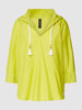 Marc Cain Blouse met zijde in een effen design Neongroen