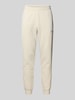 PUMA PERFORMANCE Sweatpants met labelstitching en elastische band Offwhite