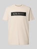 ARMANI EXCHANGE T-shirt o kroju regular fit z czystej bawełny z nadrukiem z logo Złamany biały