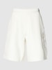 CK Calvin Klein Regular Fit Sweatshorts im unifarbenen Design Offwhite