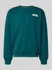 The North Face Relaxed Fit Sweatshirt aus Baumwoll-Mix Petrol
