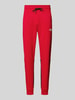 The North Face Sweatpants met labelprint Rood