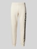 EA7 Emporio Armani Regular Fit Sweatpants mit elastischem Bund Offwhite