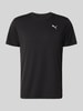 PUMA Performance t-shirt sport w kroju regular fit z nadrukiem z logo model 'TAD Essential' Czarny