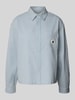 Carhartt Work In Progress Bluzka o kroju regular fit z kieszenią na piersi model ‘Toland’ Jasnoniebieski
