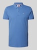 Tommy Jeans Slim fit poloshirt met logostitching Blauw
