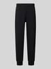 The North Face Relaxed Fit Sweatpants aus Baumwoll-Mix Modell 'EVOLUTION' Black
