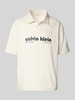 Calvin Klein Jeans Relaxed Fit Poloshirt mit Label-Print Offwhite