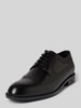 BOSS Derby mit Lochmuster Black