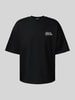 REVIEW T-shirt o kroju oversized z nadrukiem z logo Czarny