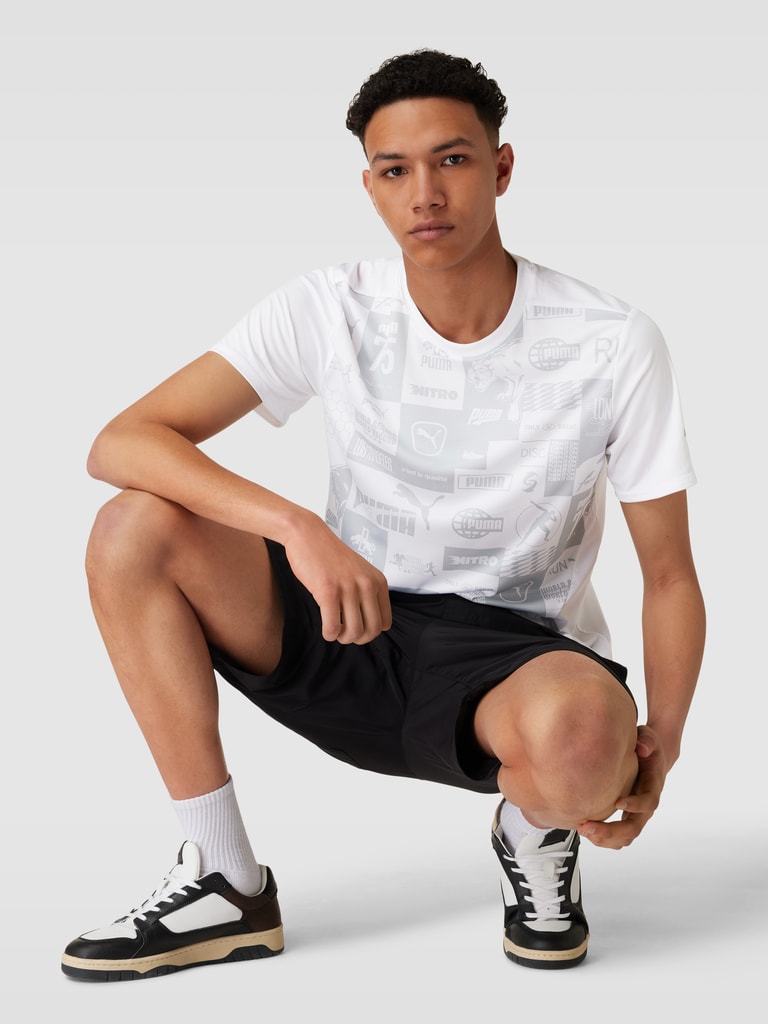 Kup online PUMA PERFORMANCE T-shirt z nadrukiem z przodu (biały)