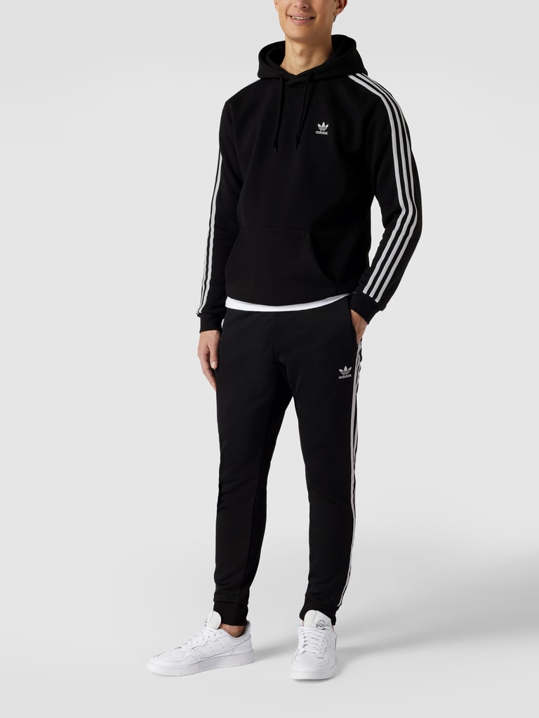 Adidas originals joggers slim fit with logo embroidery black best sale