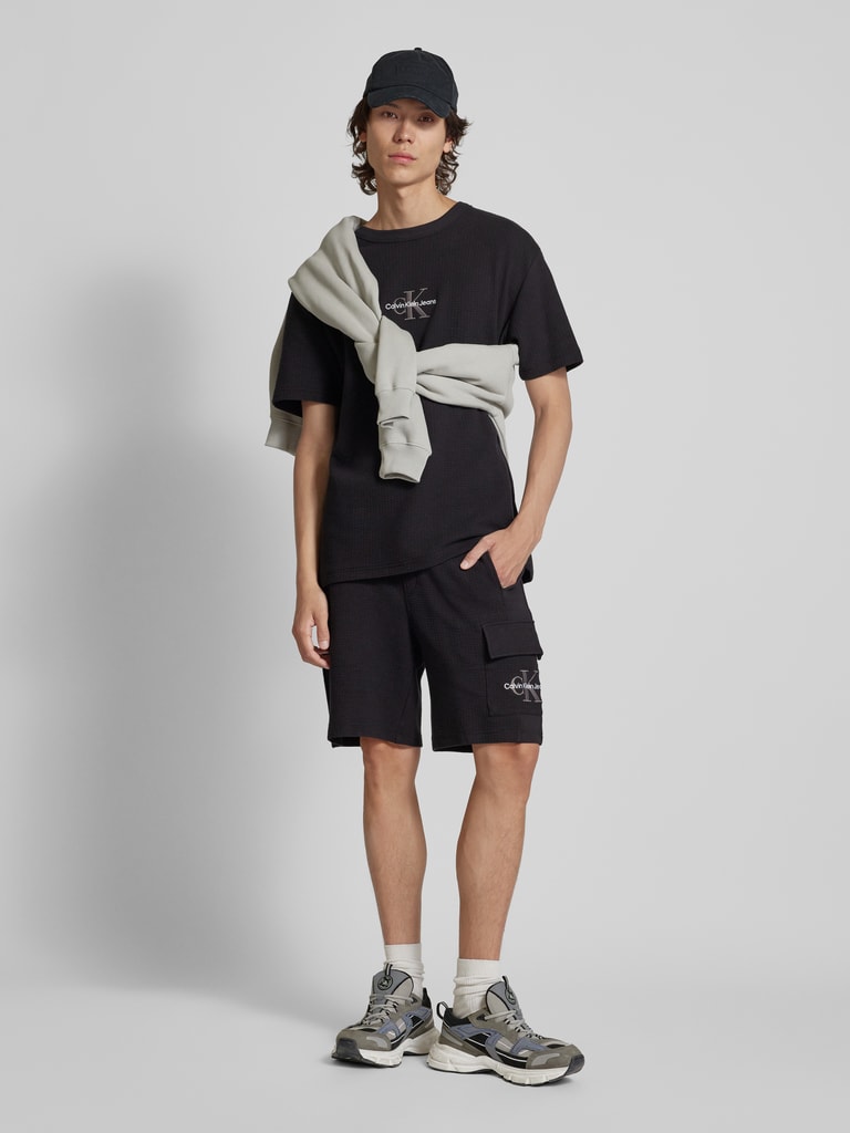 Calvin Klein Jeans Sweatshorts mit Label-Stitching (black) online 