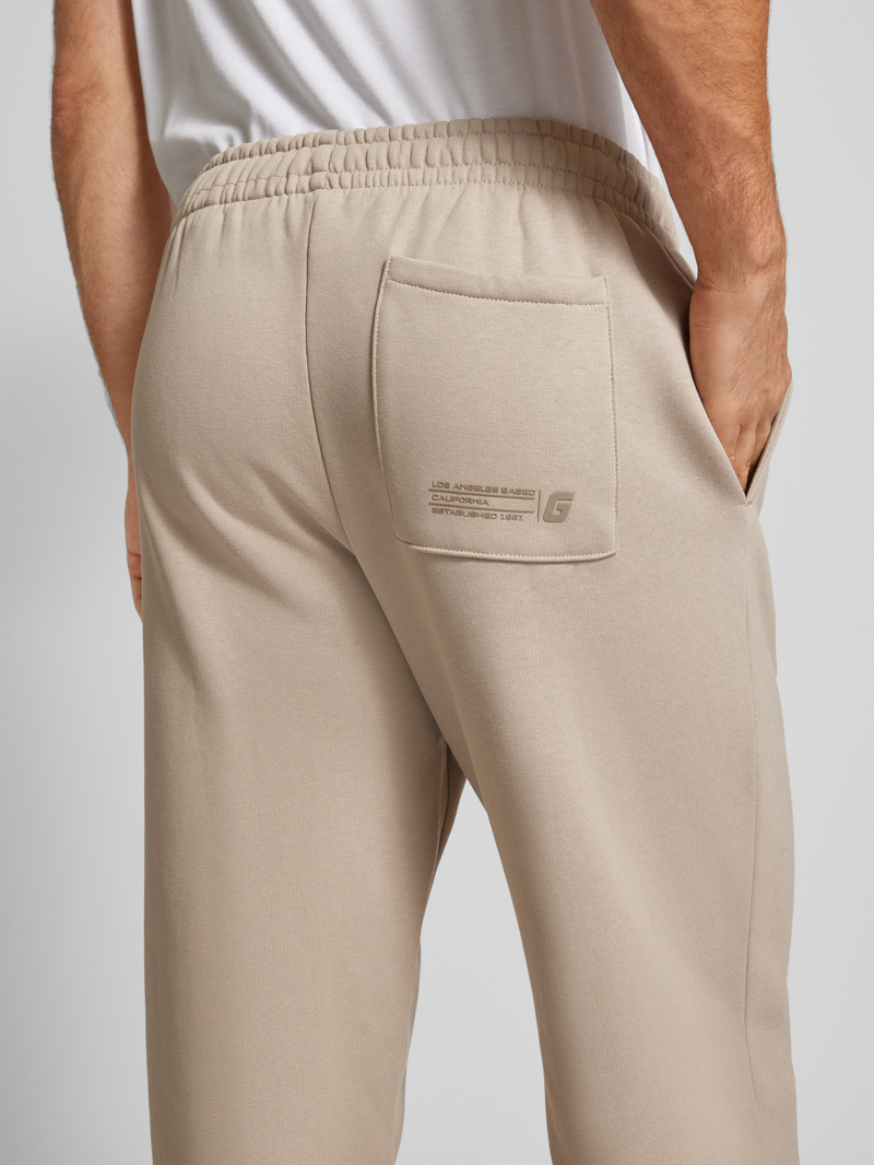 Guess Activewear Relaxed fit sweatpants met labelprint model 'EMIS'
