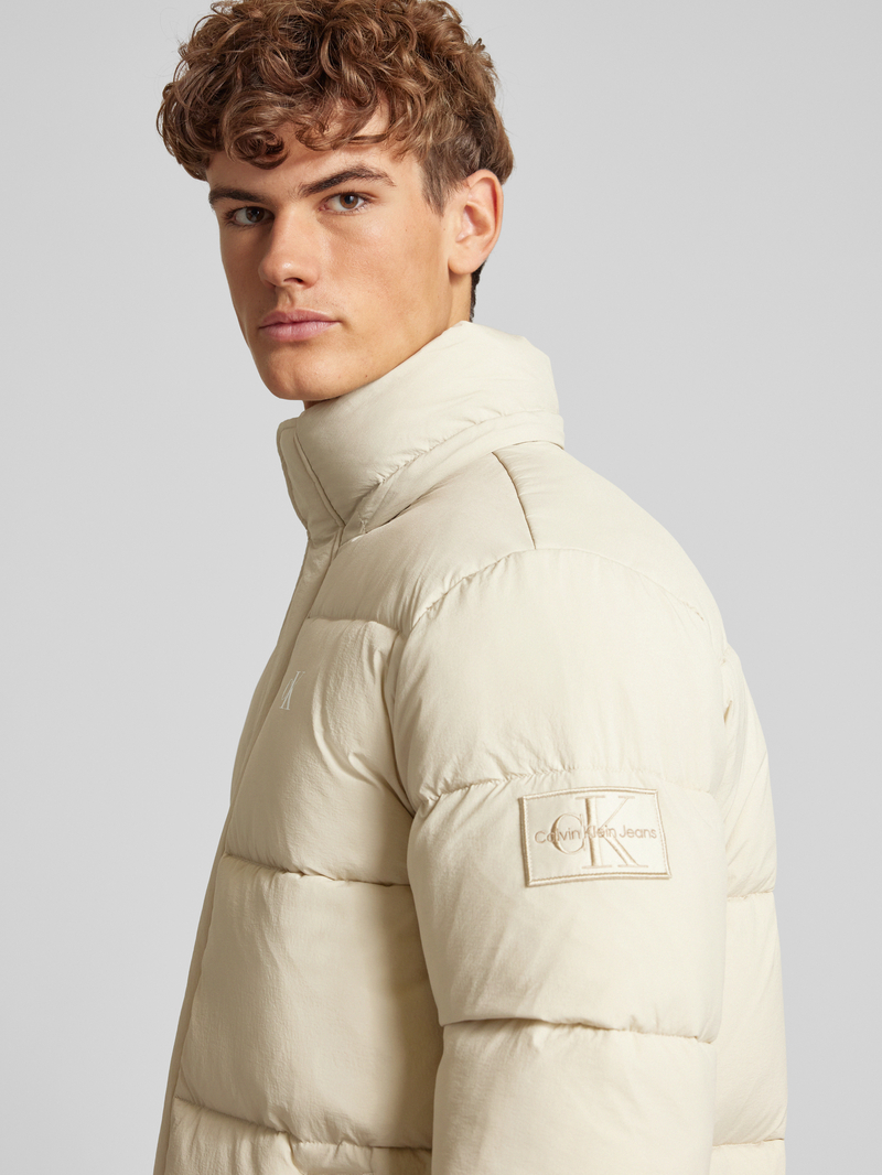 Calvin Klein Jeans Gewatteerde lange jas met logoprint model 'ESSENTIALS'