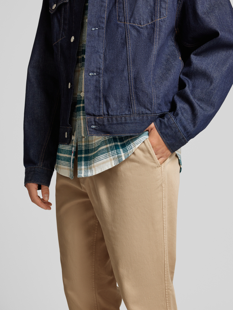 Tommy Jeans Tapered fit bandplooibroek met elastische band