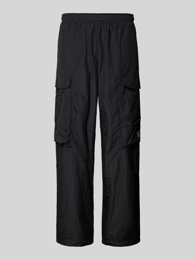 EA7 Emporio Armani Trackpants met klepzakken en logoprint