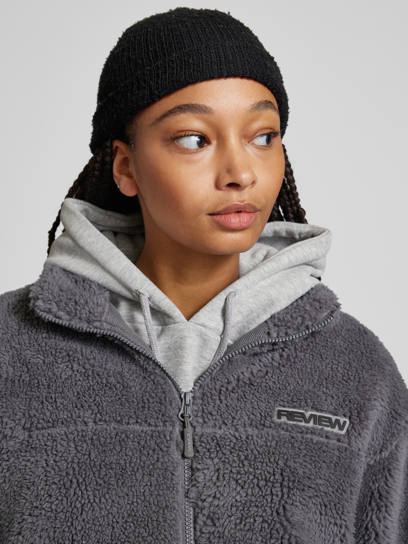 Review Sherpa jacket met labelpatch