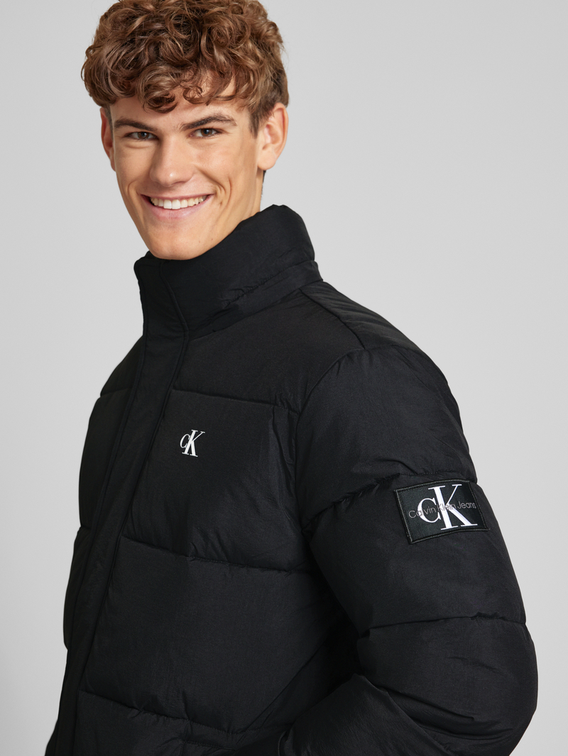 Calvin Klein Jeans Gewatteerde lange jas met logoprint model 'ESSENTIALS'