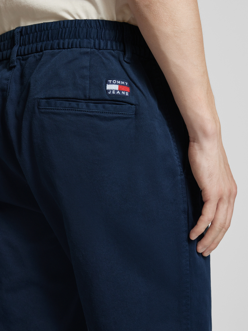 Tommy Jeans Tapered fit bandplooibroek met elastische band