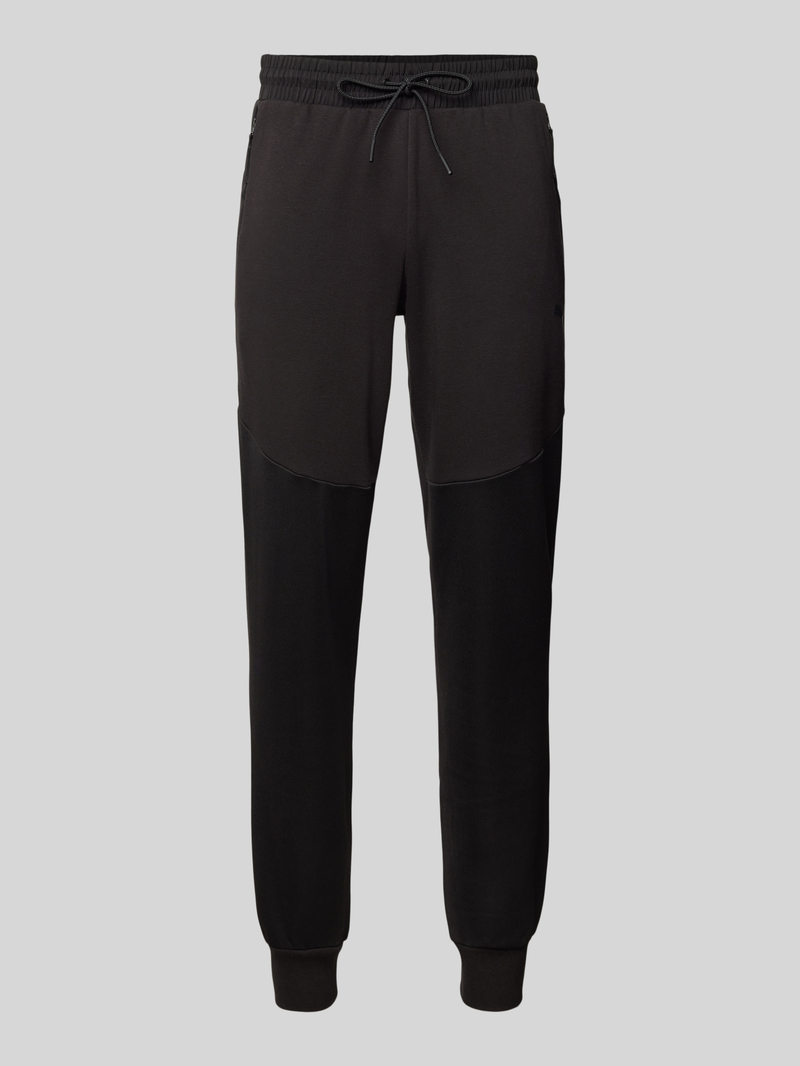 PUMA PERFORMANCE Regular fit sweatpants met labeldetail