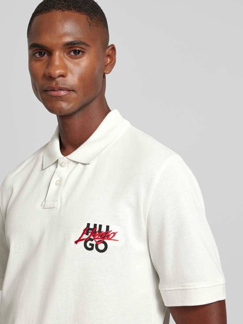 HUGO Regular fit poloshirt met labelprint en -stitching
