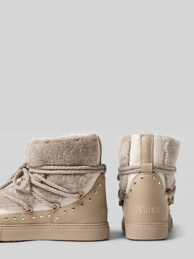 INUIKII Snowboots van leer met teddybont model 'CURLY ROCK'