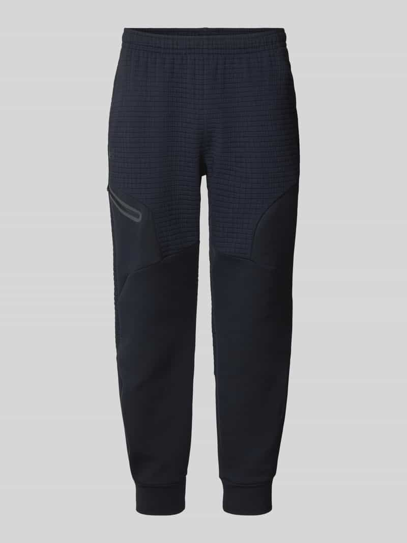 Under Armour Relaxed fit sweatpants met ritszak