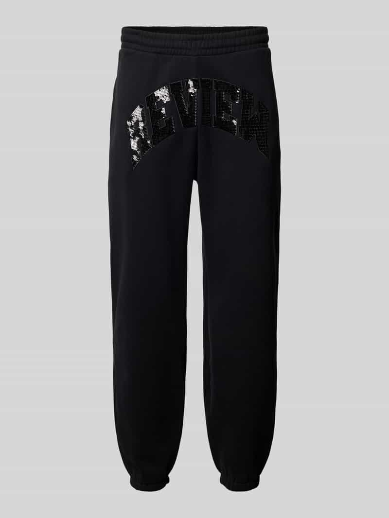 REVIEW Regular fit sweatpants met pailletten