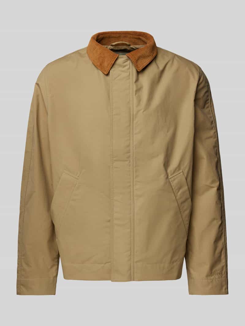Forét Jas met strookzakken model 'ROW OILSKINJACKET'