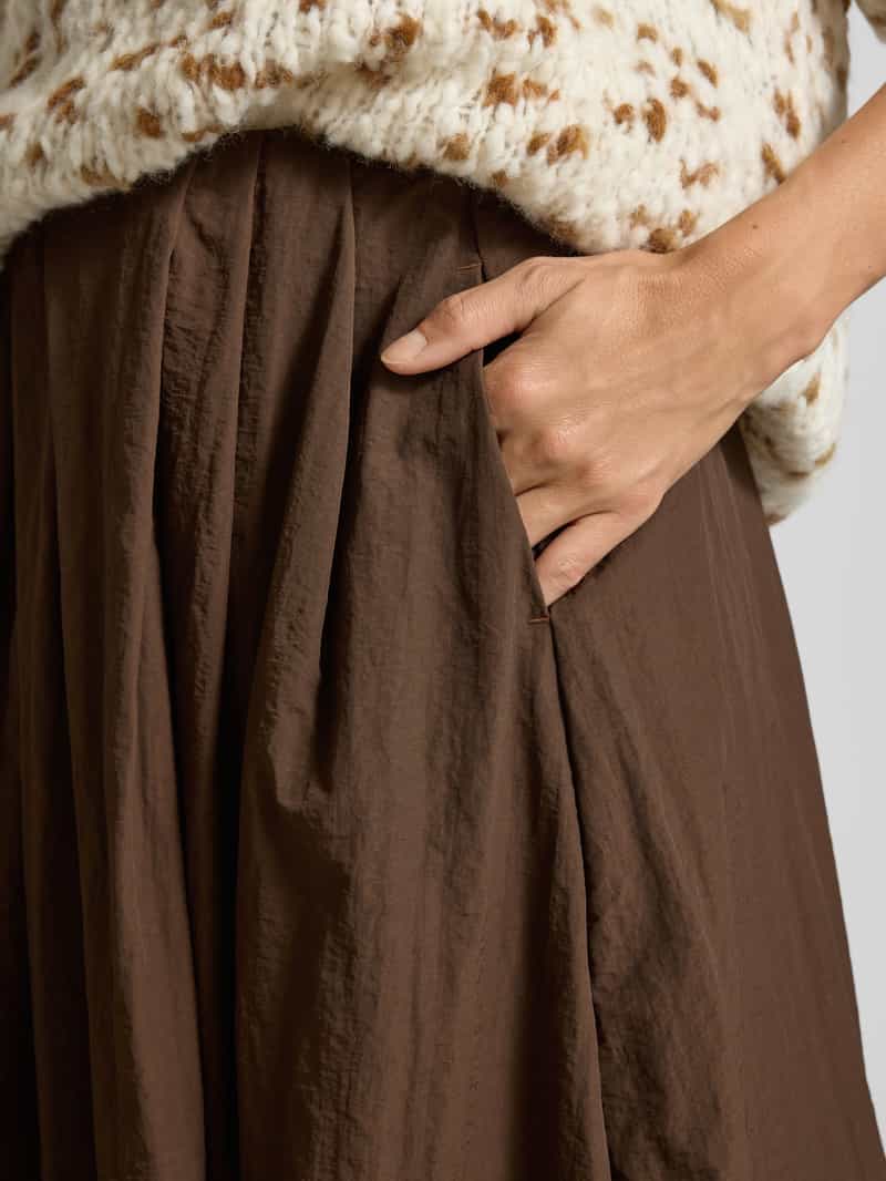 Smith and Soul Midirok in geplooide look
