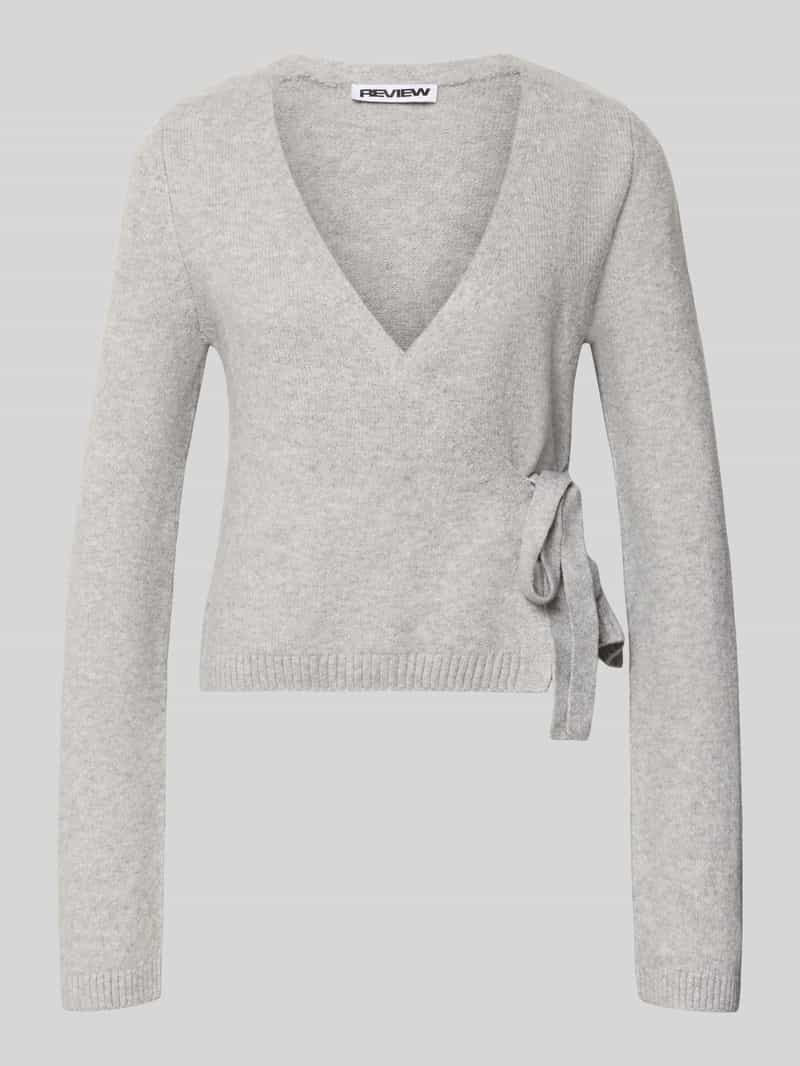 Gebreid vest in wikkeloptiek