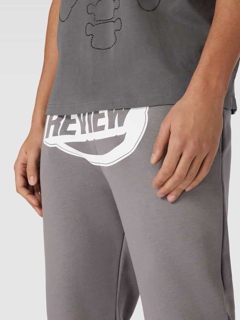 REVIEW Sweatpants met gewatteerde logoprint
