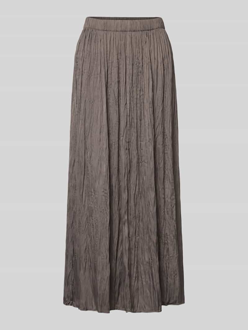 Oui Midirok in geplooide look