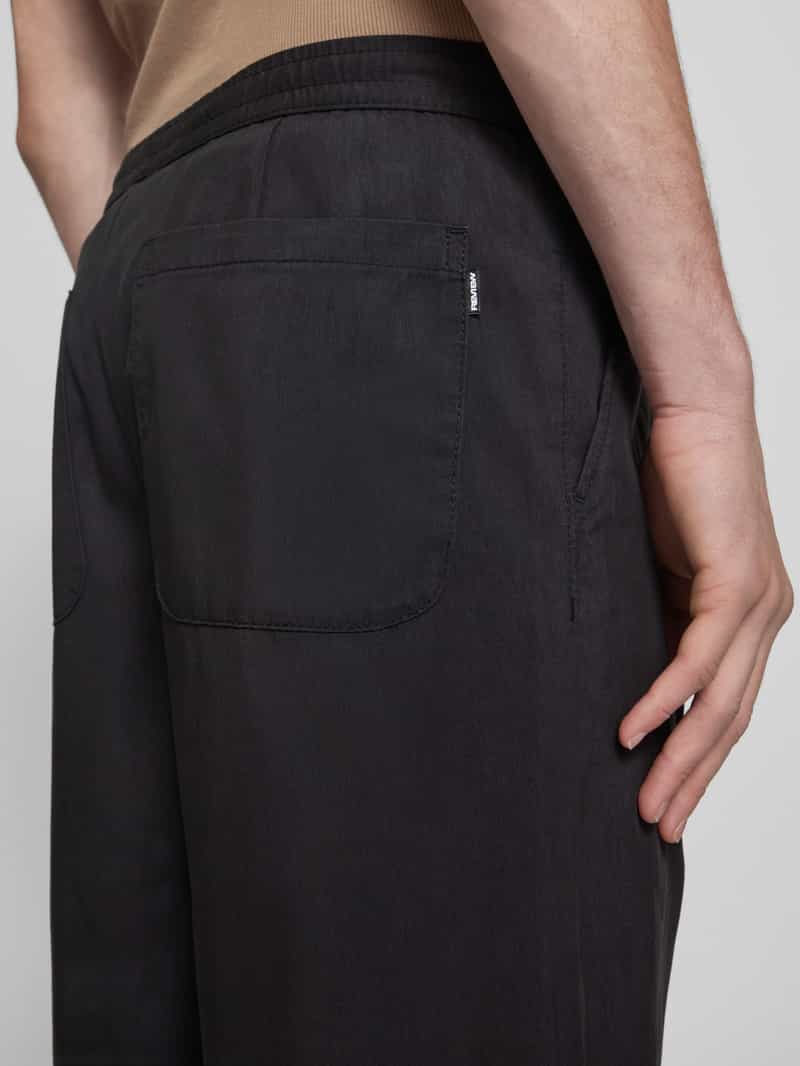 REVIEW Stoffen broek met achterzakken