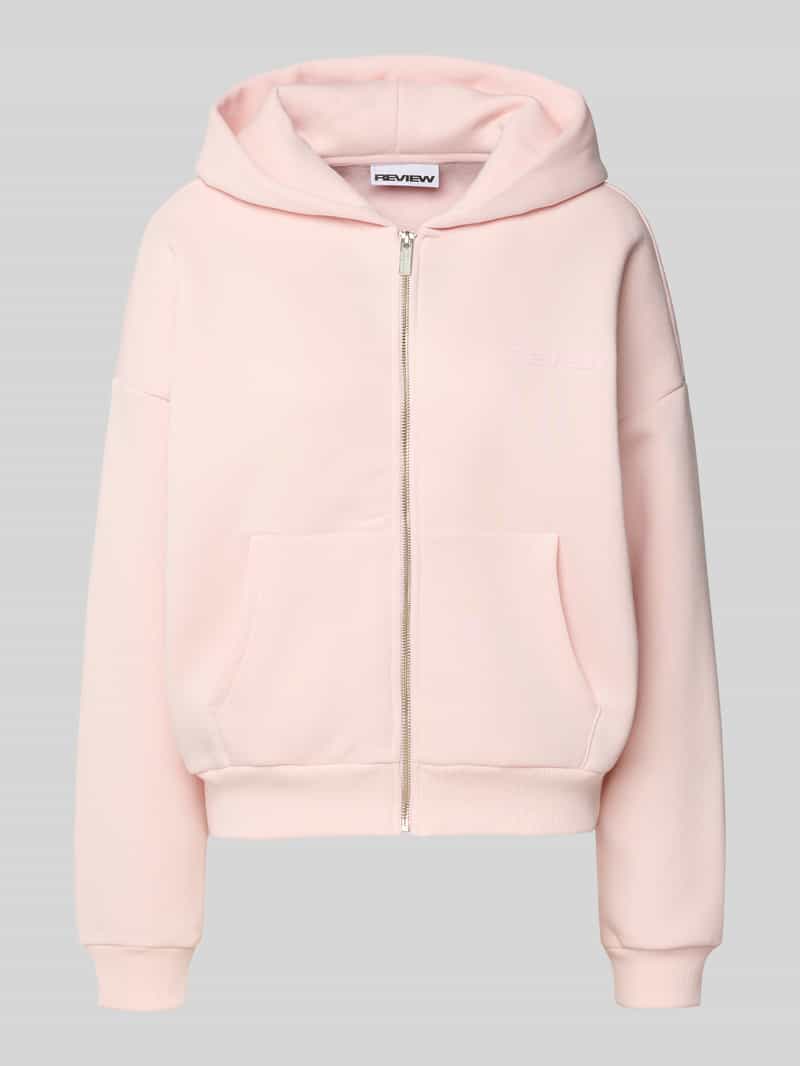 Review Oversized sweatjack met capuchon