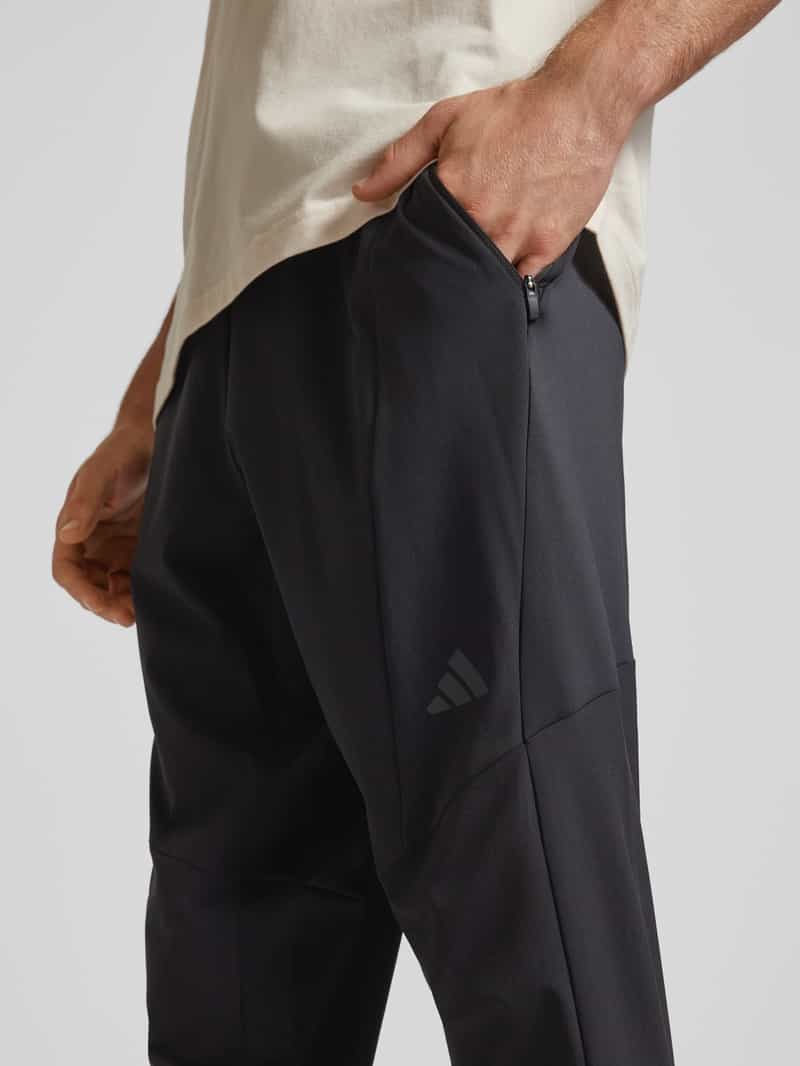 Adidas Training Tapered fit sweatpants met ritszakken