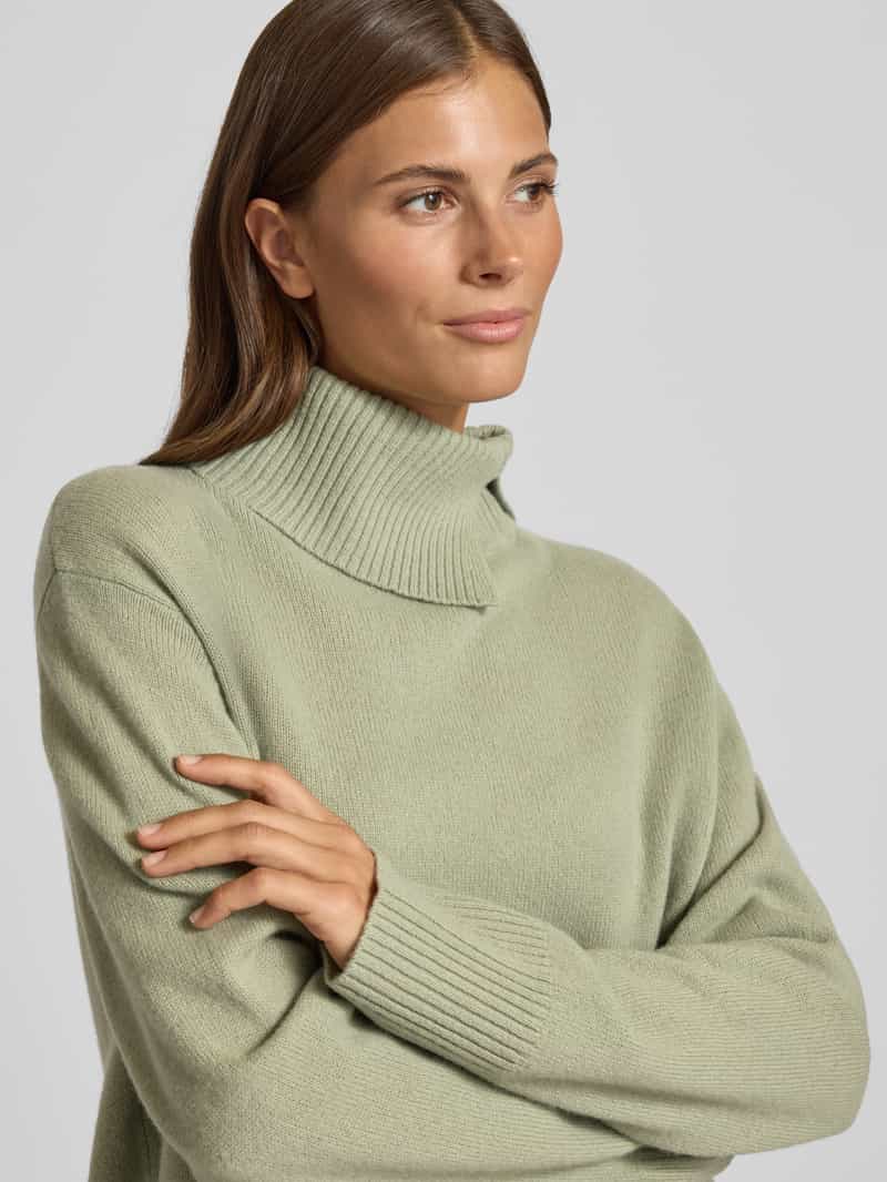 Christian Berg Woman Gebreide pullover van lanawol met col en zijsplitten