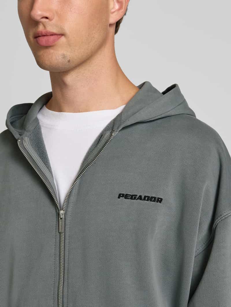 Pegador Oversized sweatjack met logostitching en capuchon