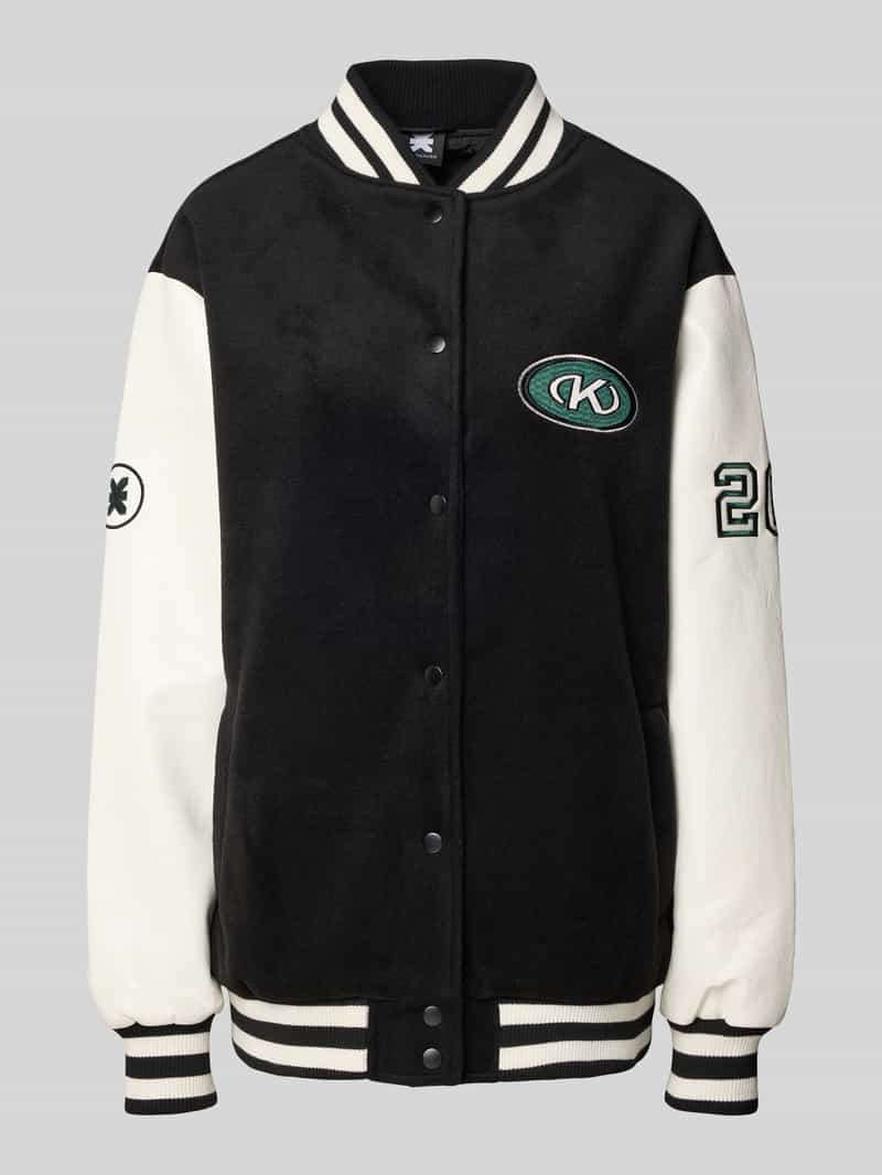 Karo Kauer Collegejack met label- en motiefstitchings