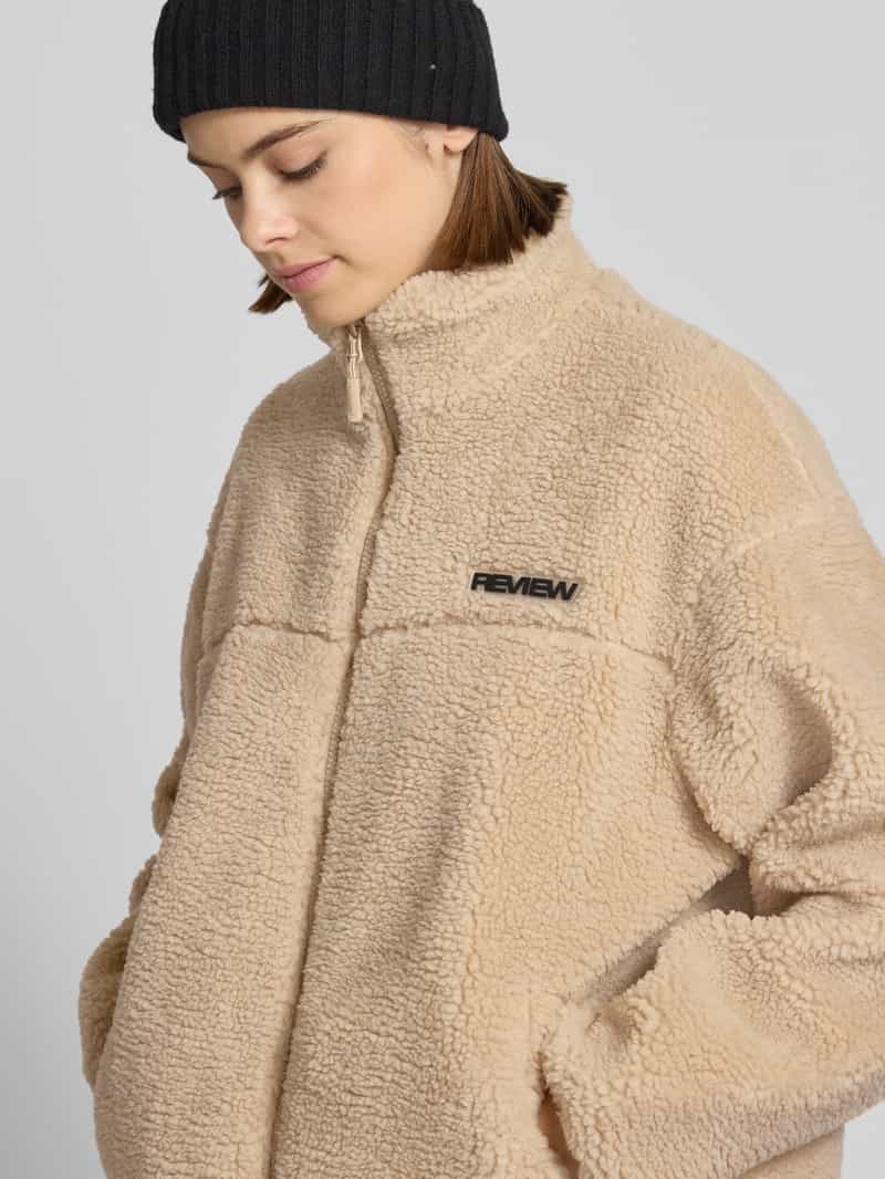 Review Fleecejack met opstaande kraag en labeldetail