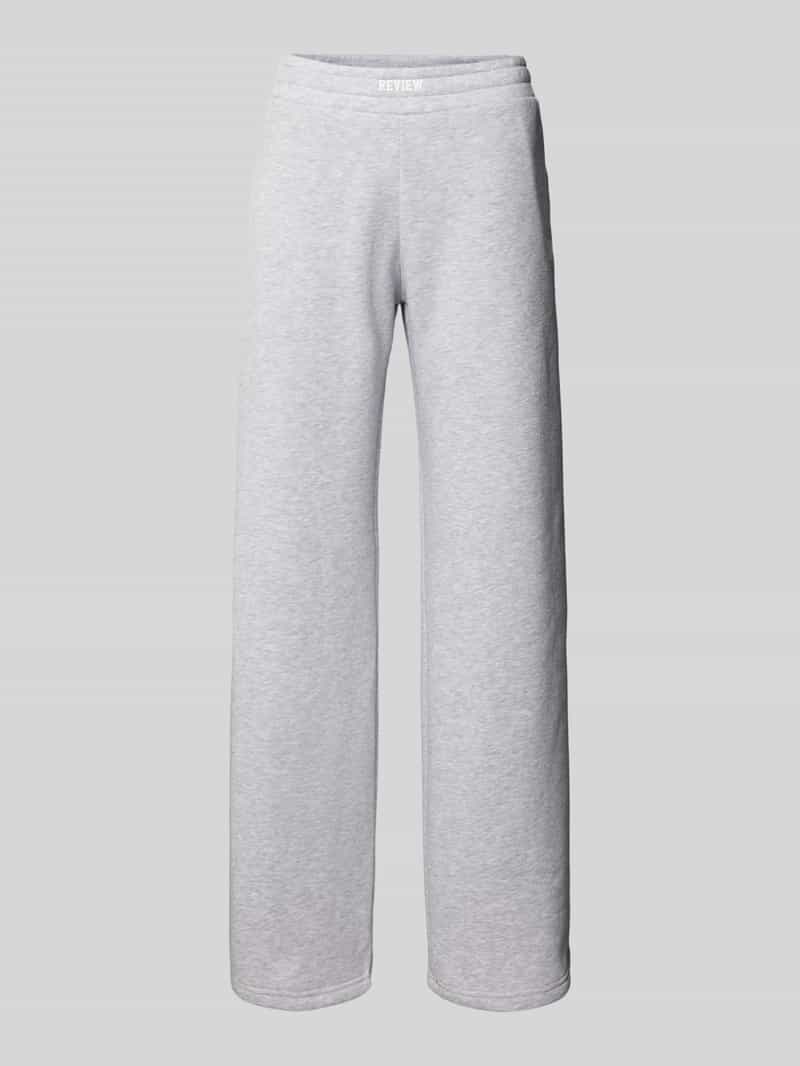 Review Wide leg sweatpants met labeldetail