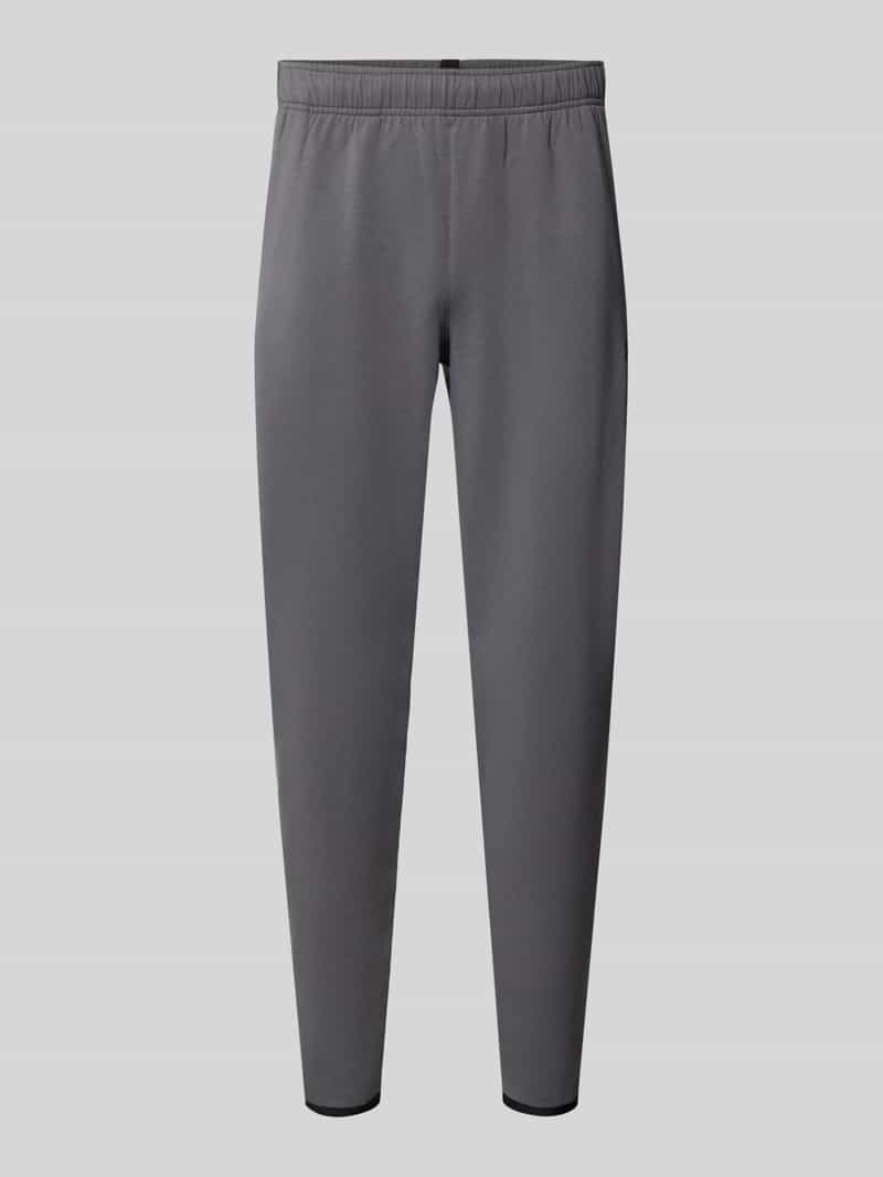 Under Armour Regular fit trainingsbroek met katoen-aandeel model 'Unstoppable'