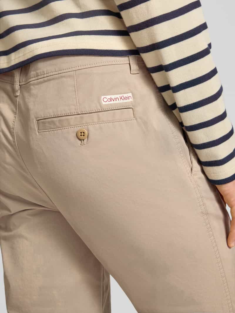 Calvin Klein Jeans Slim fit chino met steekzakken